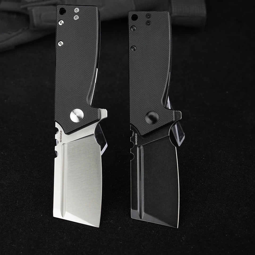 SHOOZIZ HAN307-BGS and HAN307-BGB folding knives open, comparing satin and black PVD D2 steel blades with black G10 handles, black background.