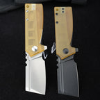 SHOOZIZ HAN307-JUS and HAN307-JUB folding knives open, comparing satin and black PVD D2 steel blades with translucent yellow Ultem handles, black background.