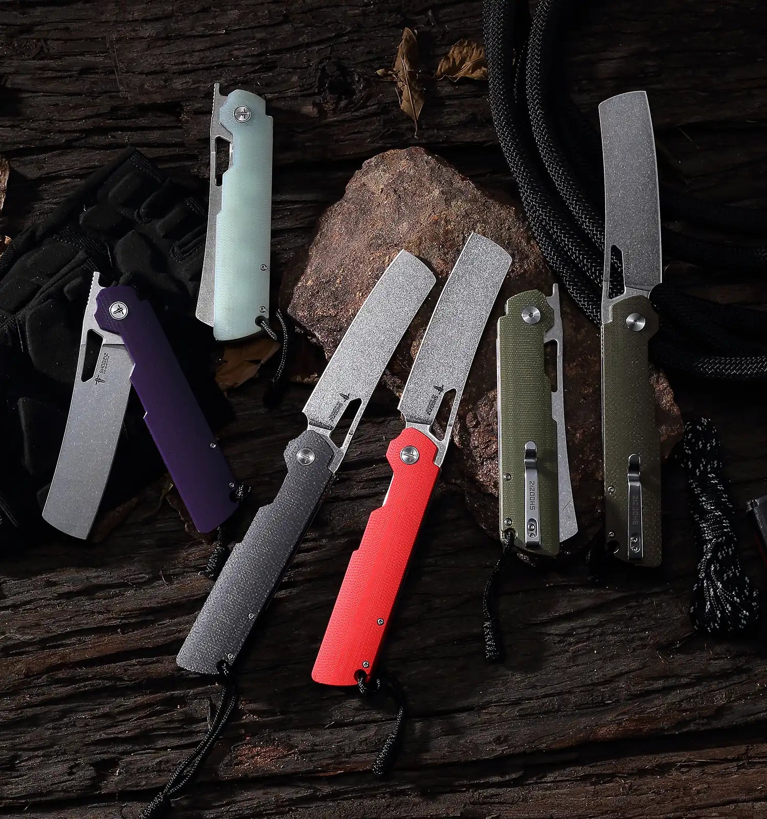 Mobile banner featuring a collection of SHOOZIZ XUN119A knives, highlighting the series' bold color combinations and ceramic bearing action. D2 steel blades, ideal for daily carry and tactical use.