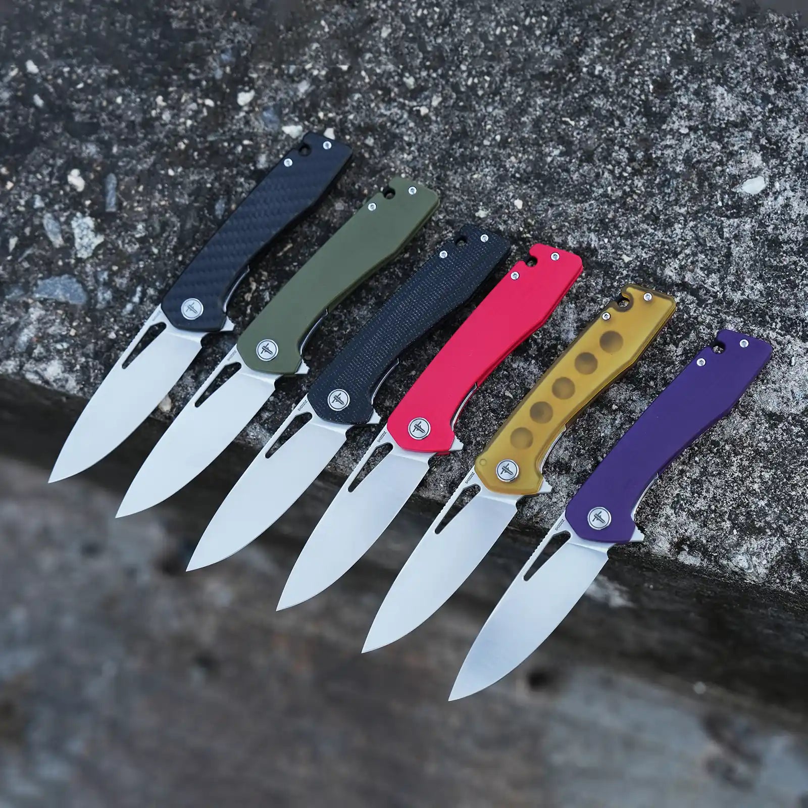 SHOOZIZ XUN120 satin finish models lined up on stone background, featuring XUN120-CFGS, XUN120-GGS, XUN120-BMS, XUN120-RGS, XUN120-JUS, and XUN120-PGS handles.