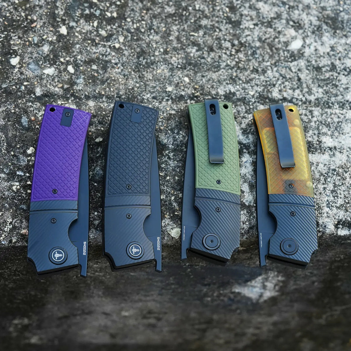 SHOOZIZ XUN122 black PVD models lineup closed, featuring purple G10, black G10, green G10, and Ultem handles with black steel bolsters.